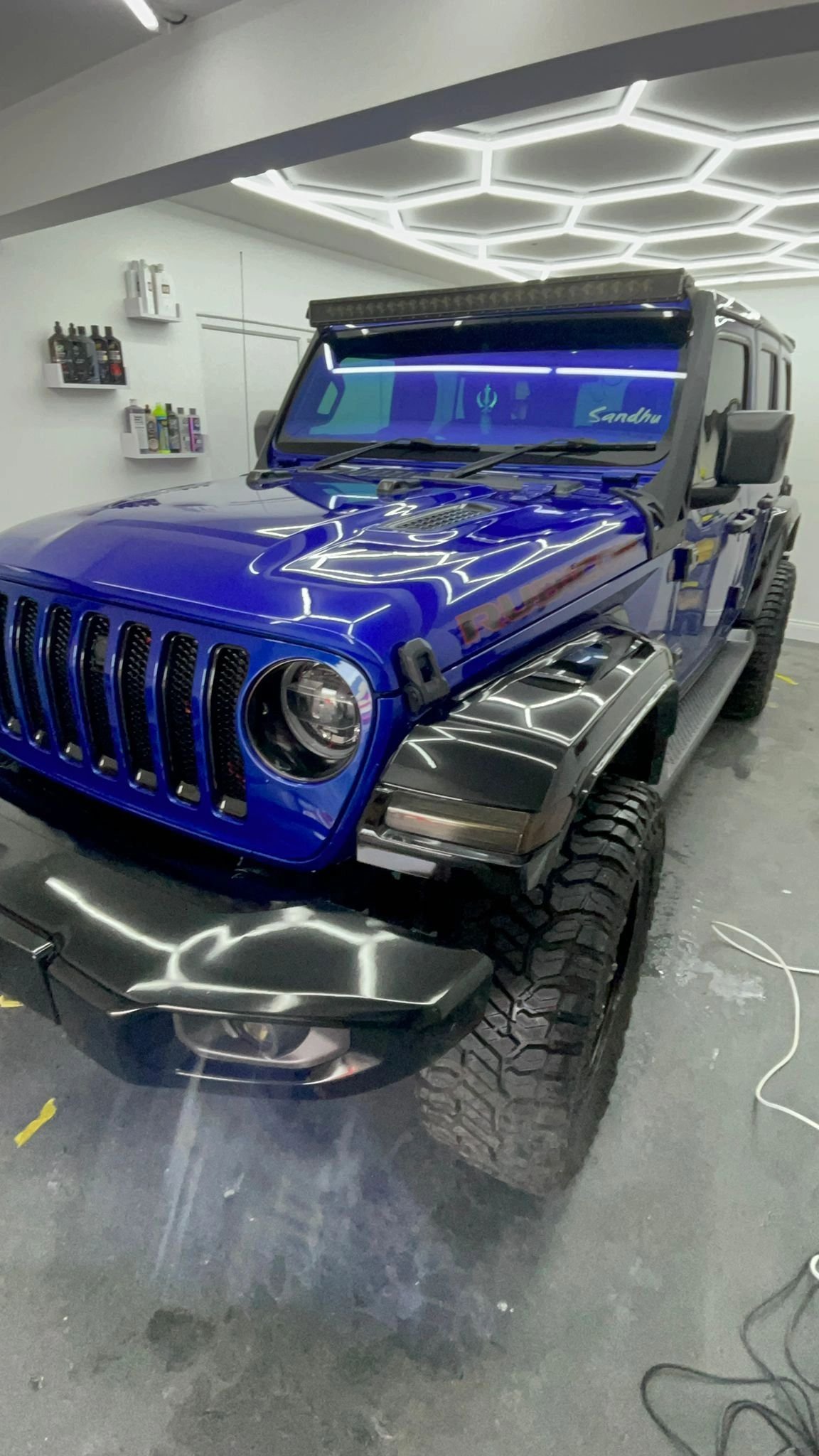 Blue Jeep in the Wicked detailing studio
